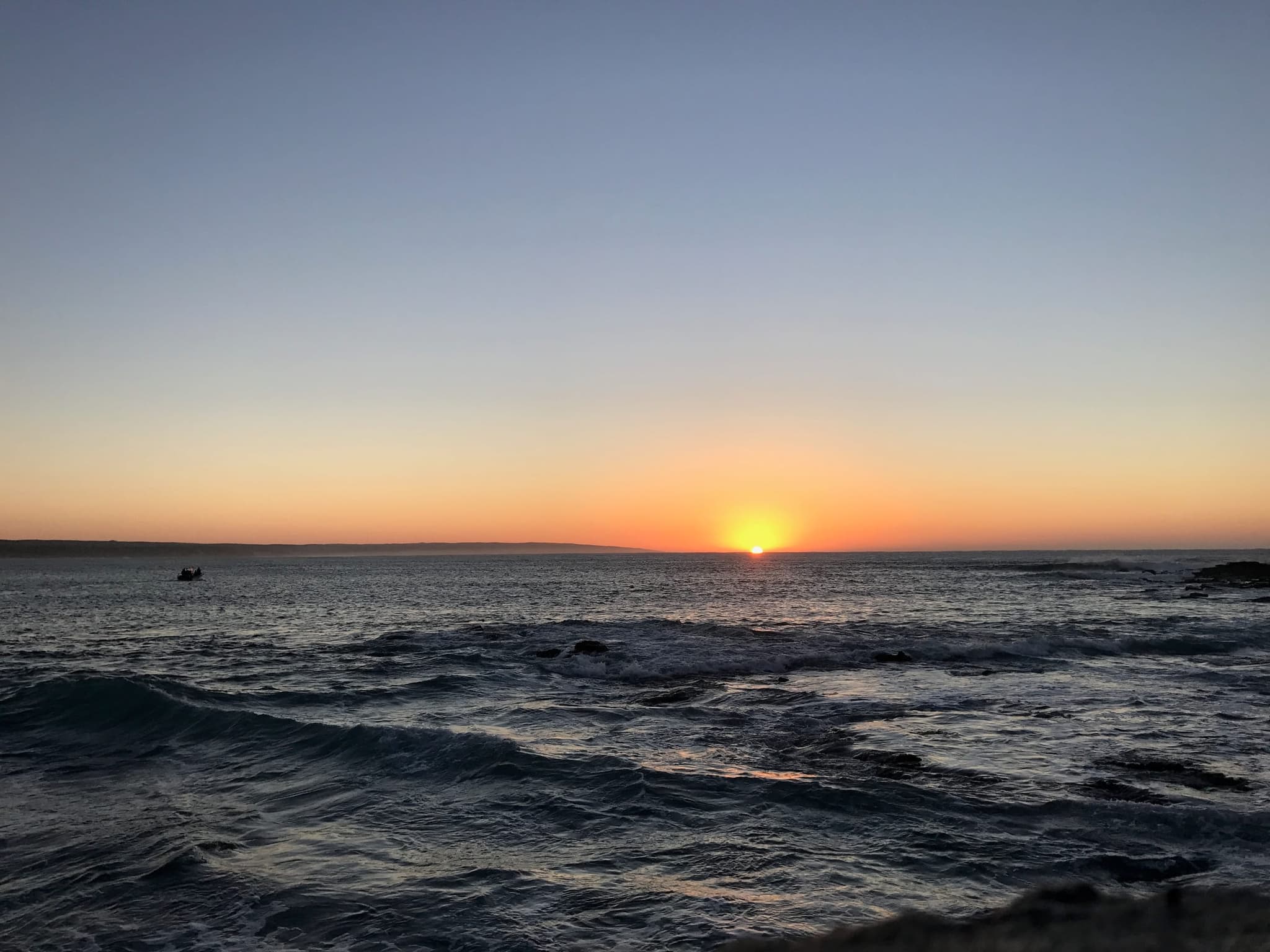 The sun setting over the sea at Stilbaai.